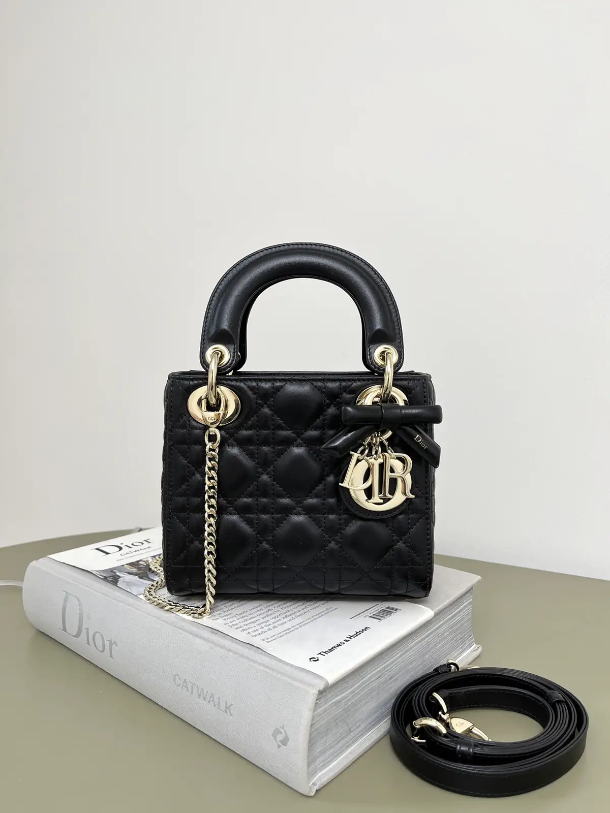 Dior Black Quilted Top Handle Bag with Bow Charm image 1