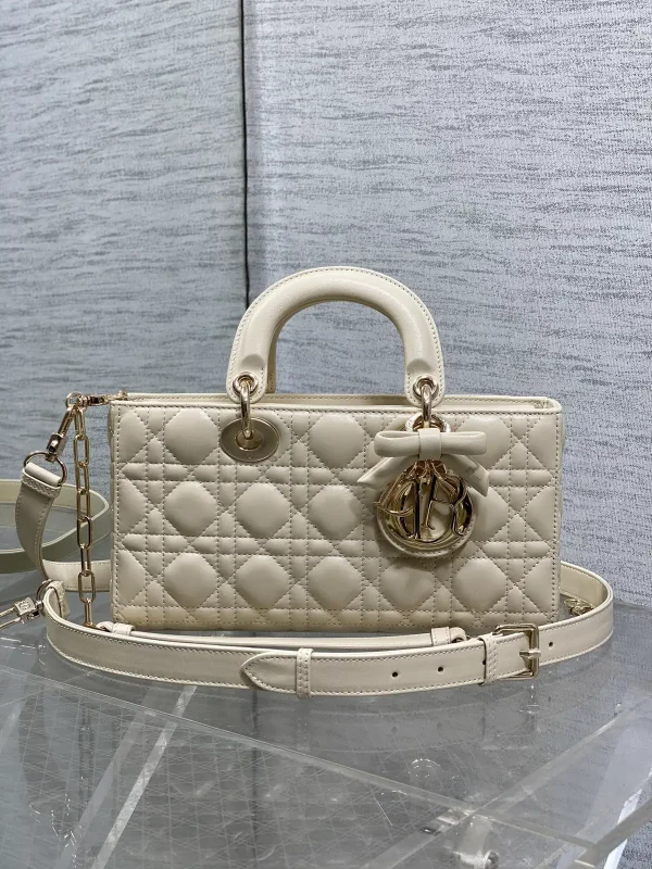 Dior Quilted Top Handle Bag with Bow Charm image 1