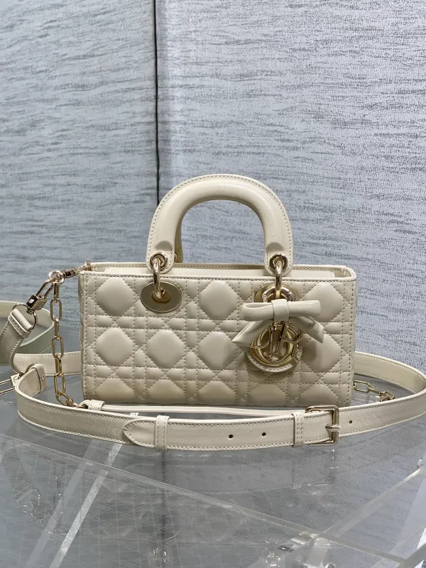 Dior Quilted Top Handle Bag with Bow Charm image 1