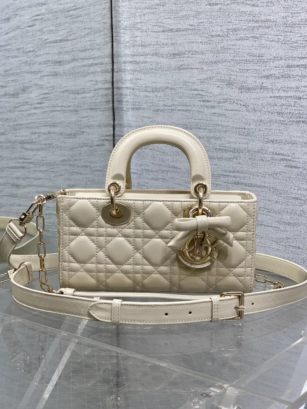 Dior Quilted Top Handle Bag with Bow Charm image 1