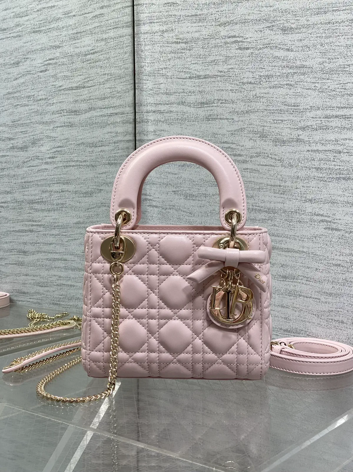 Dior Quilted Top Handle Bag with Bow Charm image 1