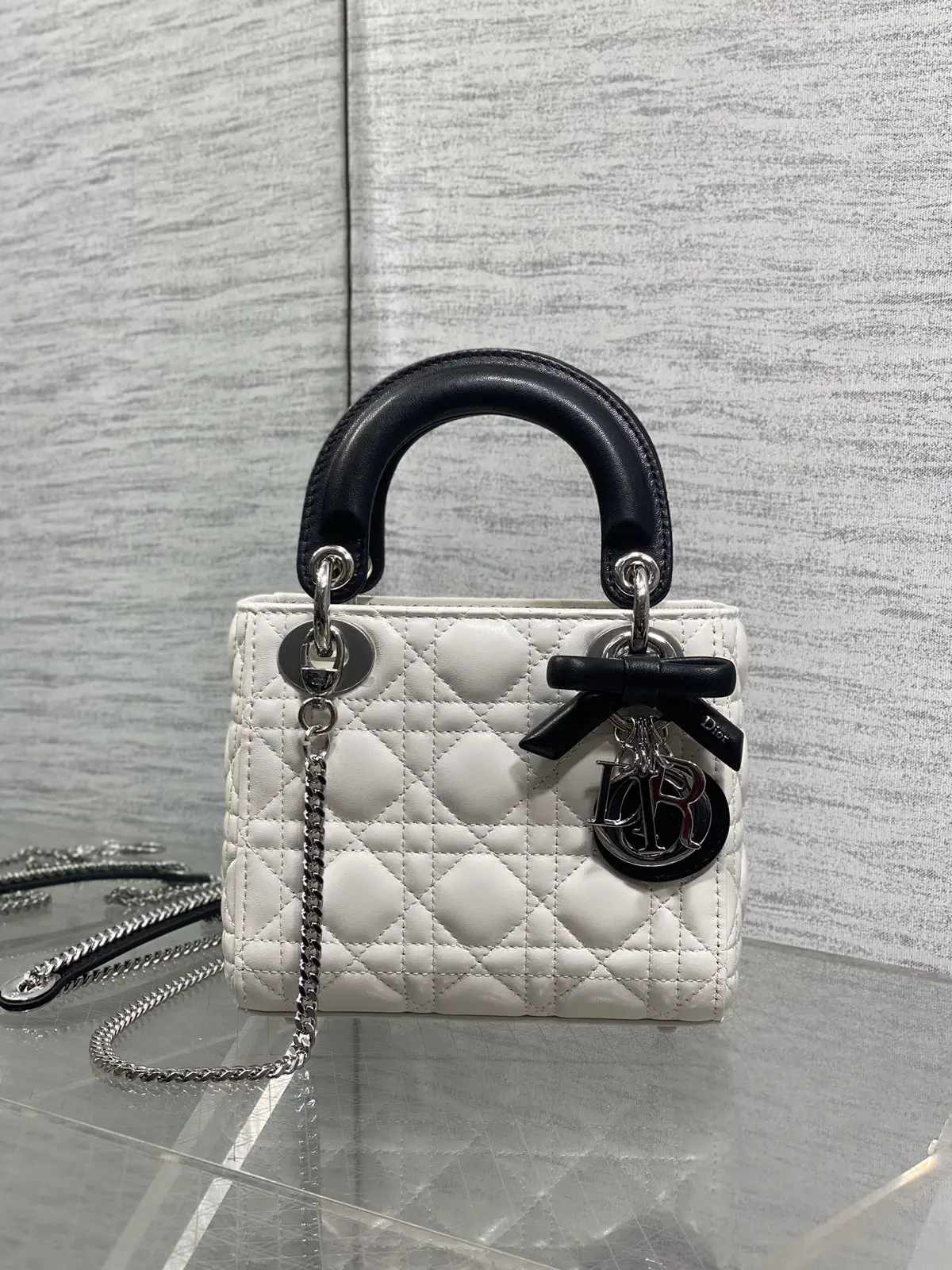 Dior Quilted Top Handle Bag with Bow Charm image 1