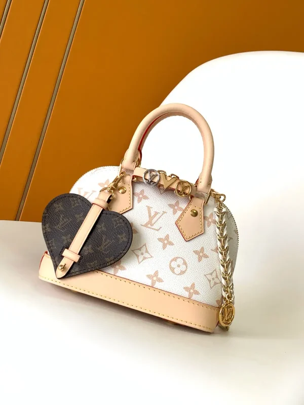 Louis Vuitton Monogram Mini Alma Top Handle Bag with Heart Charm image 1