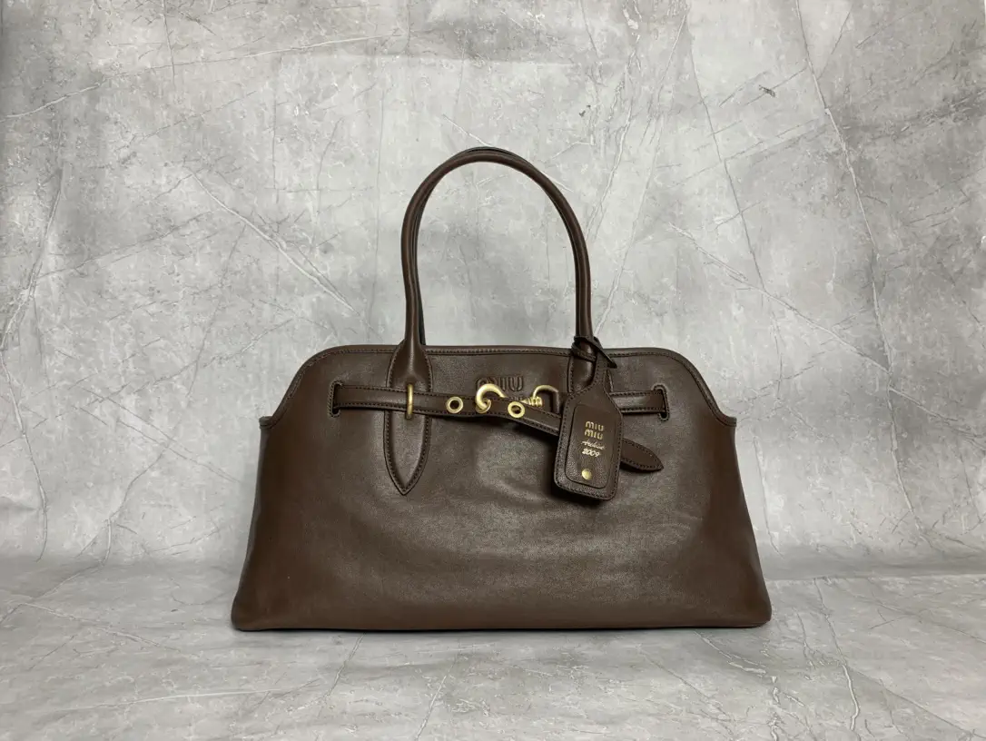 Miu Miu Embossed Logo Top Handle Bag image 1