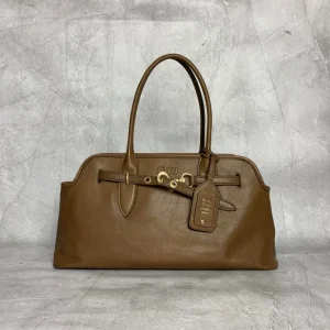 Miu Miu Embossed Logo Top Handle Bag image 1