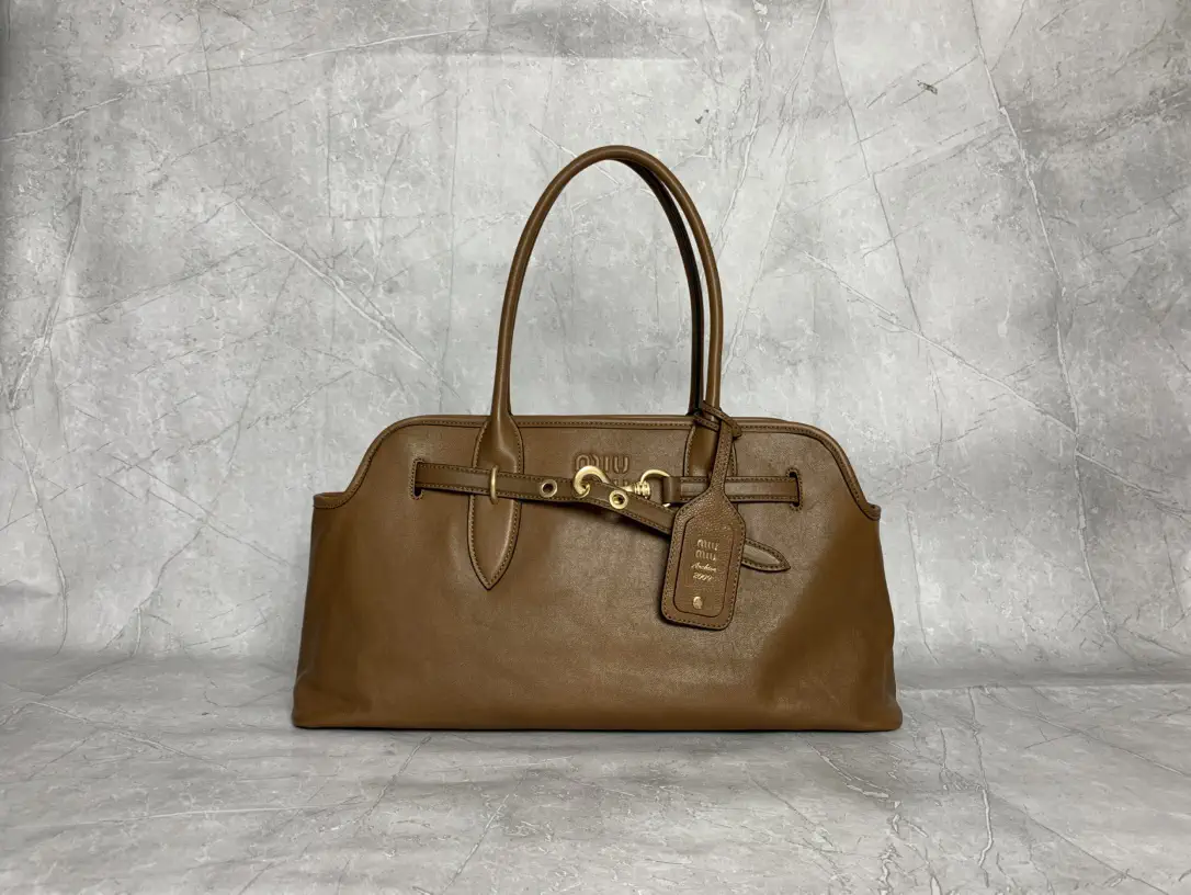Miu Miu Embossed Logo Top Handle Bag image 1
