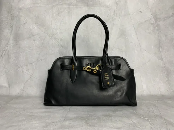 Miu Miu Embossed Logo Top Handle Bag image 1