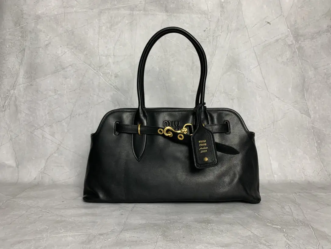 Miu Miu Embossed Logo Top Handle Bag image 1
