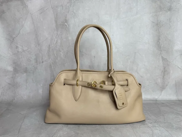 Miu Miu Embossed Logo Top Handle Bag image 1