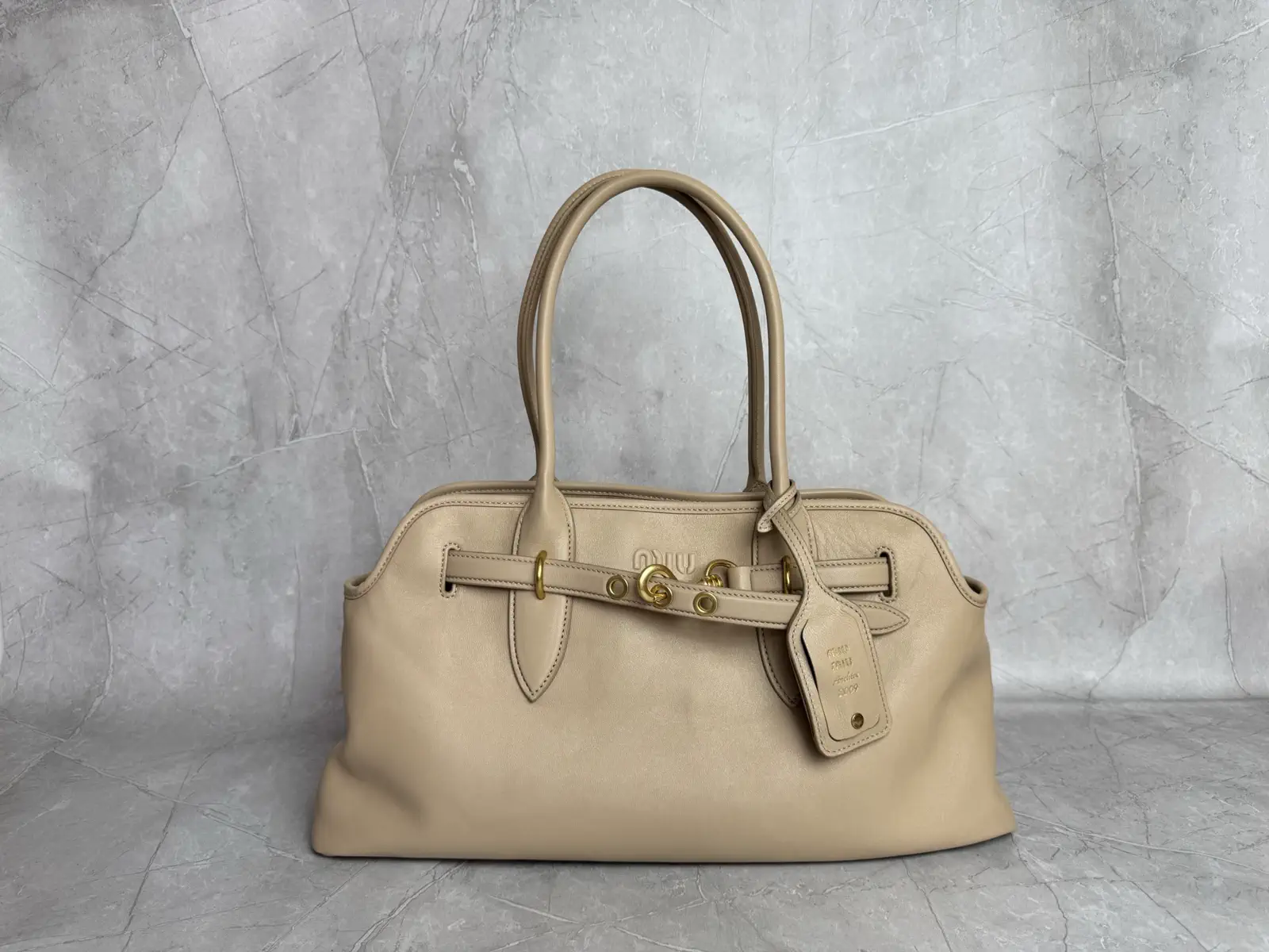 Miu Miu Embossed Logo Top Handle Bag image 1