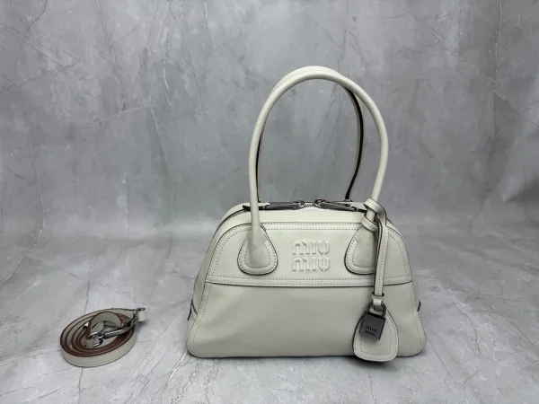 Miu Miu Embossed Logo Top Handle Bag image 1