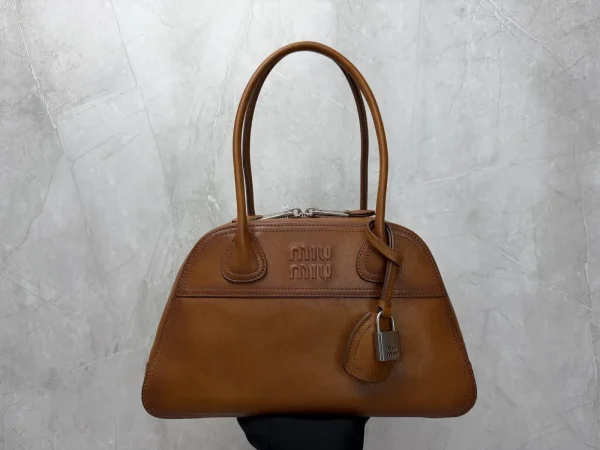 Miu Miu Embossed Logo Leather Bowling Bag image 1