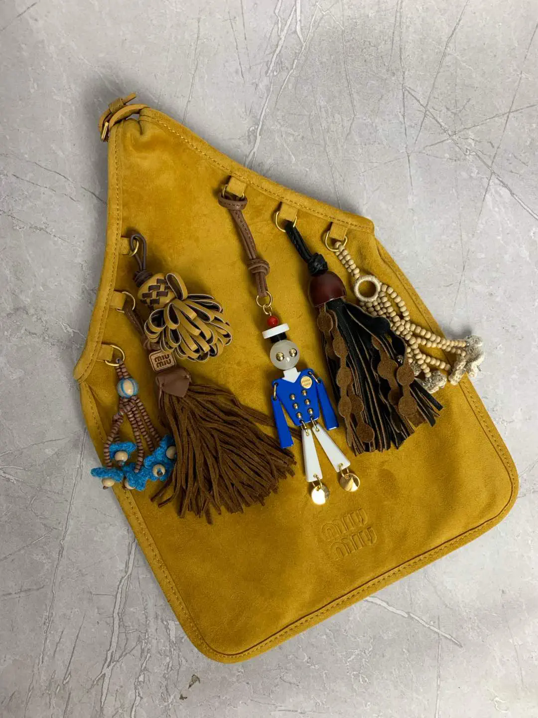 Miu Miu Suede Top Handle Bag with Decorative Charms image 1