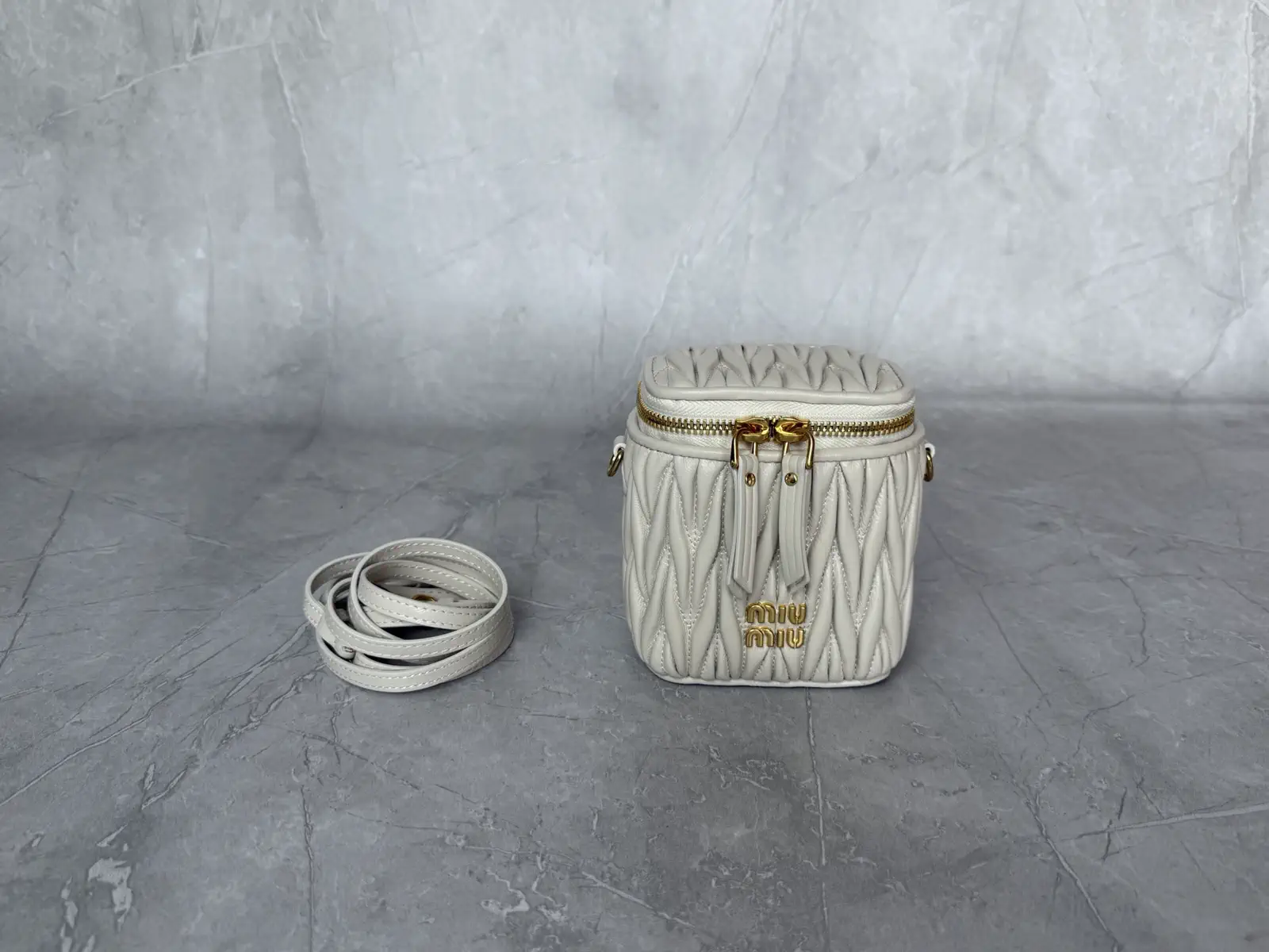 Miu Miu Quilted Mini Crossbody Cosmetic Bag image 1
