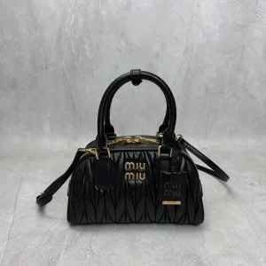 Miu Miu Quilted Top Handle Crossbody Bag image 1