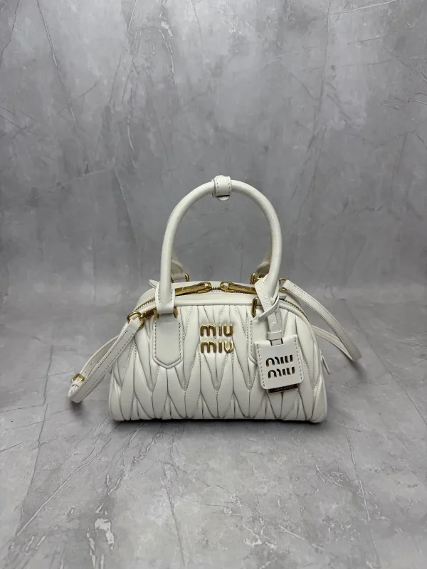 Miu Miu Quilted Top Handle Crossbody Bag image 1