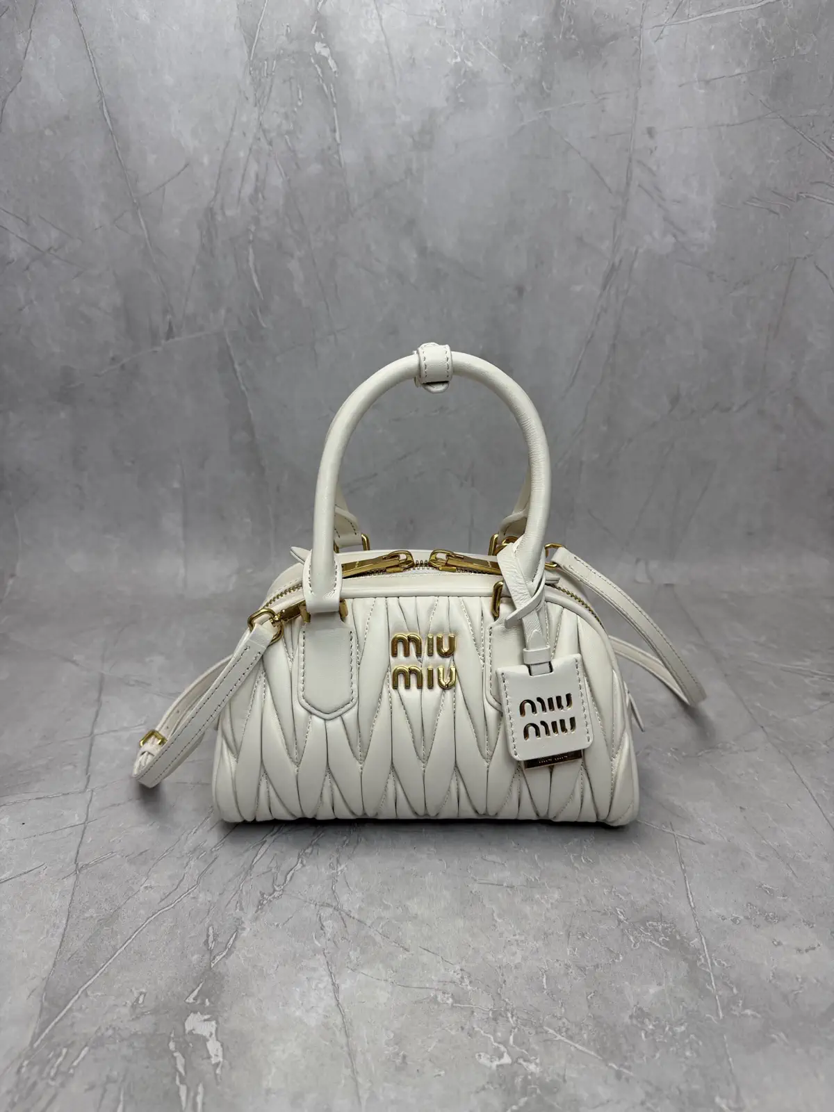 Miu Miu Quilted Top Handle Crossbody Bag image 1