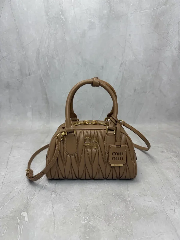 Miu Miu Quilted Top Handle Crossbody Bag image 1