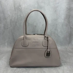Miu Miu Embossed Logo Top Handle Bag image 1