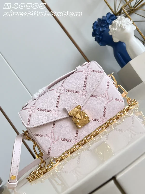 Louis Vuitton Light Pink Monogram Empreinte Pochette Métis East-West Bag image 1