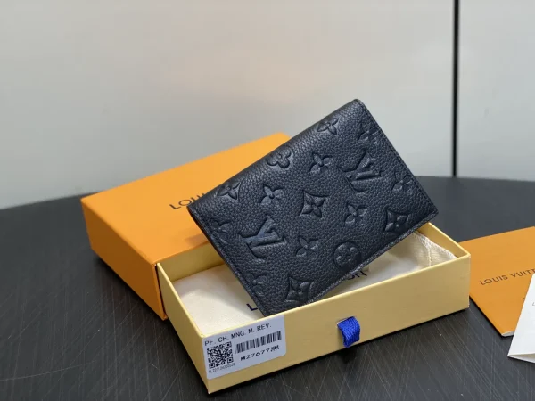 Louis Vuitton Black Embossed Monogram Passport Cover image 1