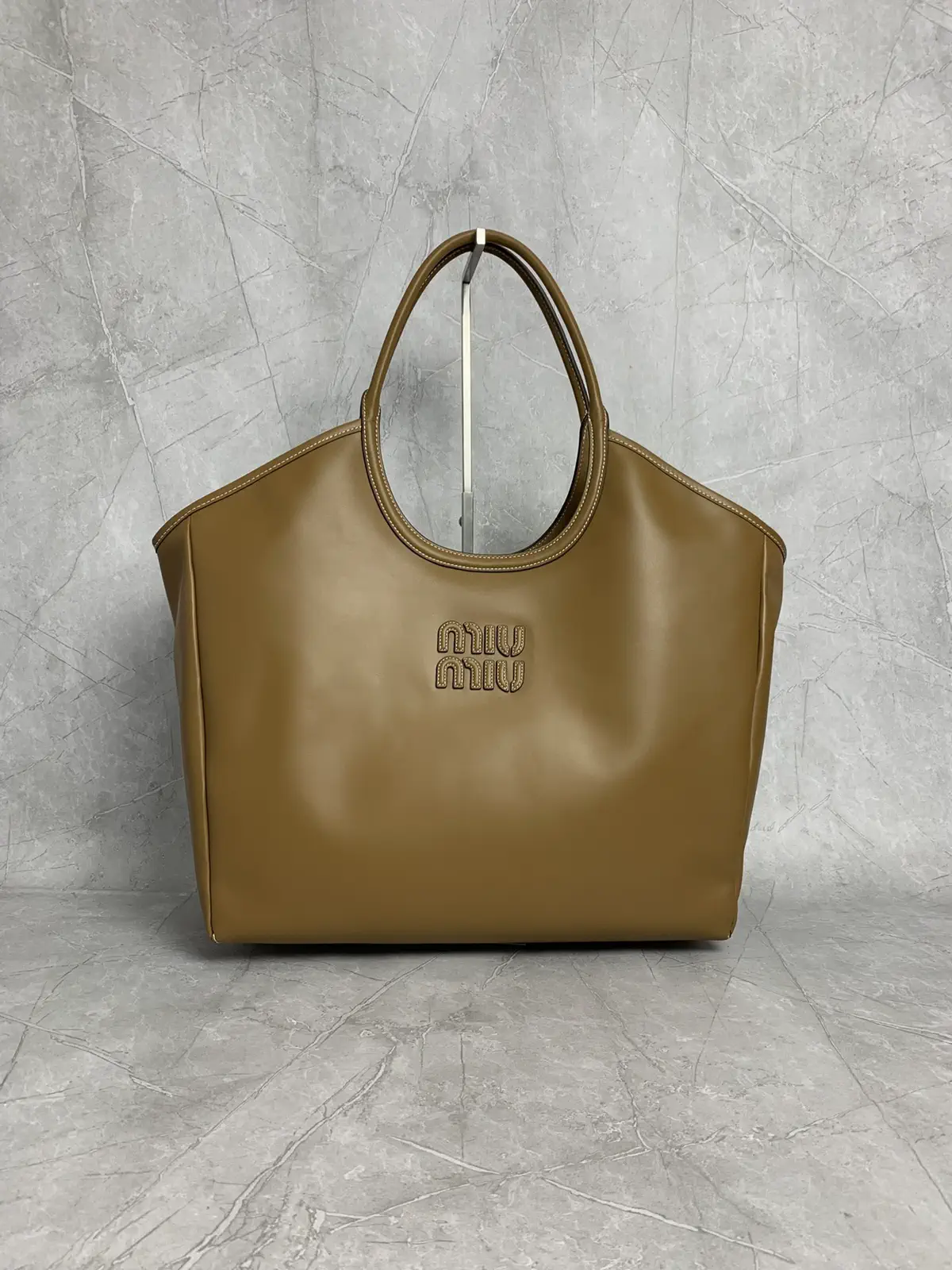 Miu Miu Embossed Logo Tote Bag image 1