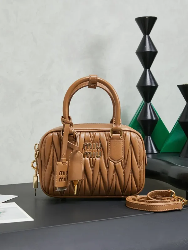 Miu Miu Quilted Leather Top Handle Bag image 1