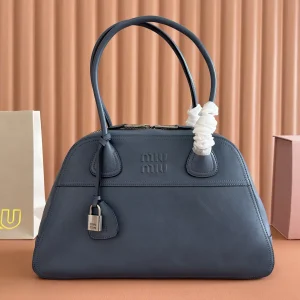 Miu Miu Embossed Logo Top Handle Bag image 1