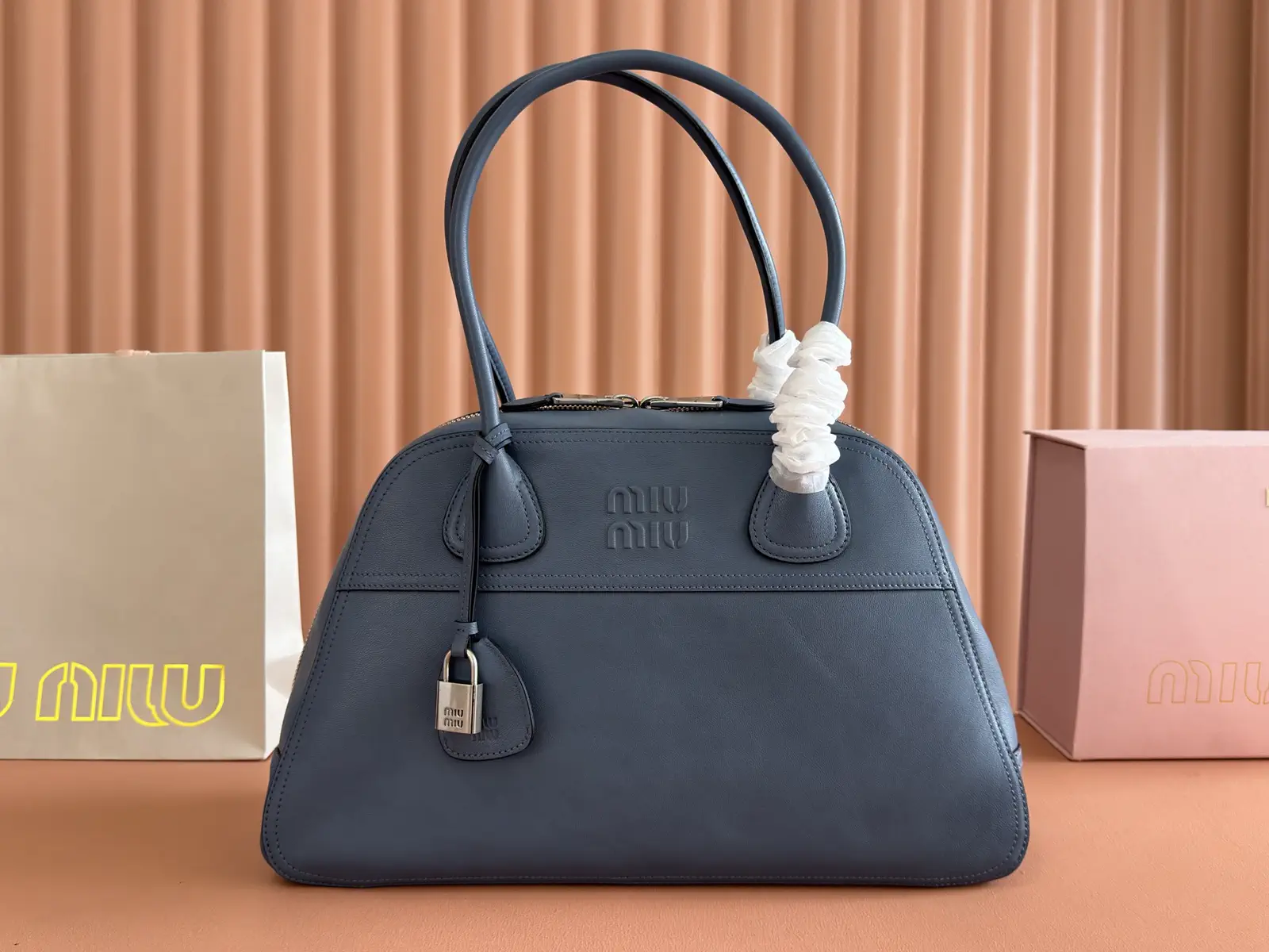 Miu Miu Embossed Logo Top Handle Bag image 1