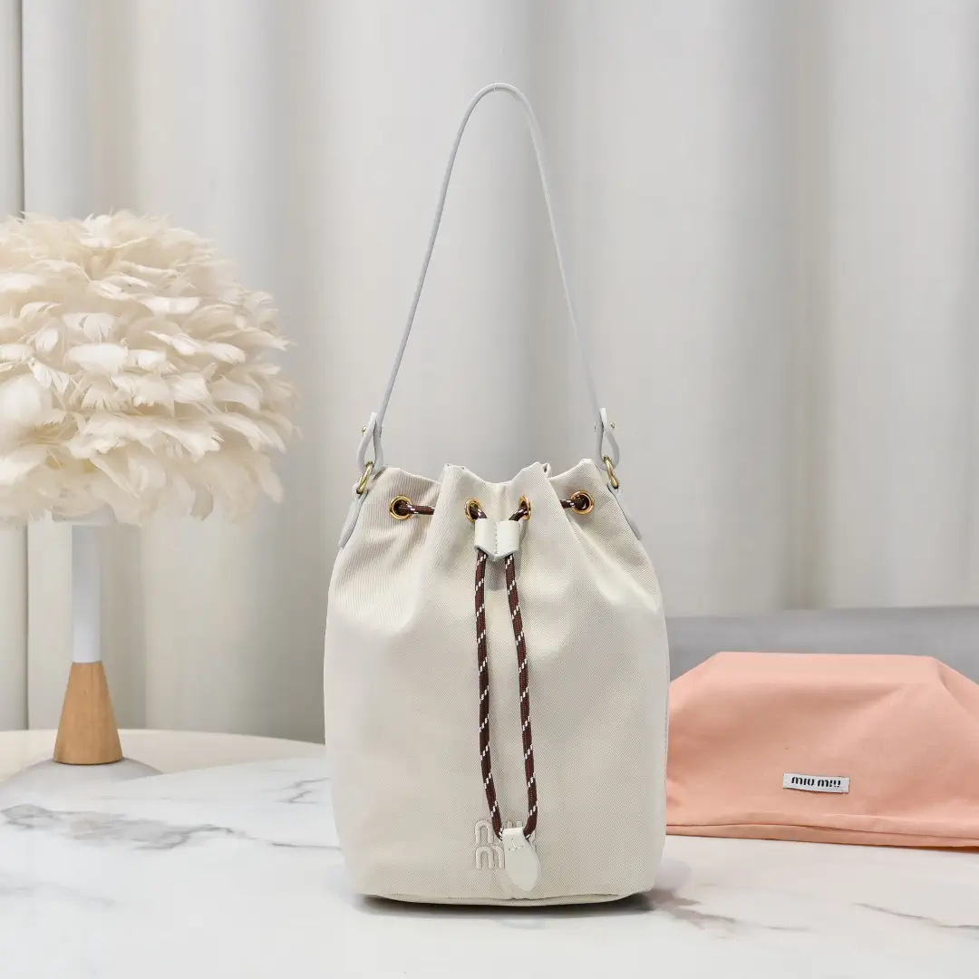 Miu Miu Canvas Bucket Bag image 1