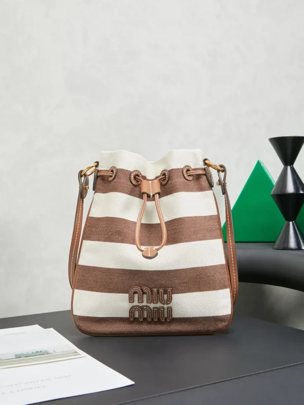 Miu Miu Striped Drawstring Bucket Bag image 1