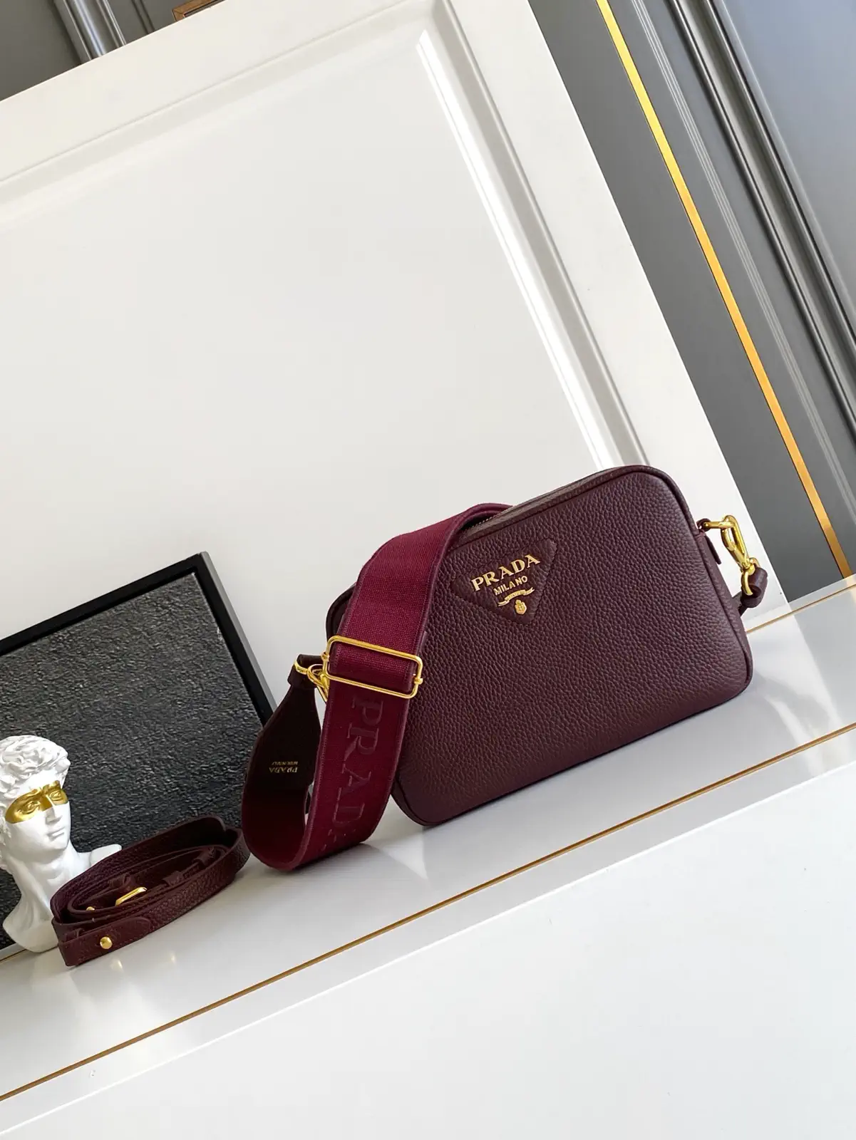 Prada Burgundy Leather Crossbody Bag with Dual Shoulder Straps image 1