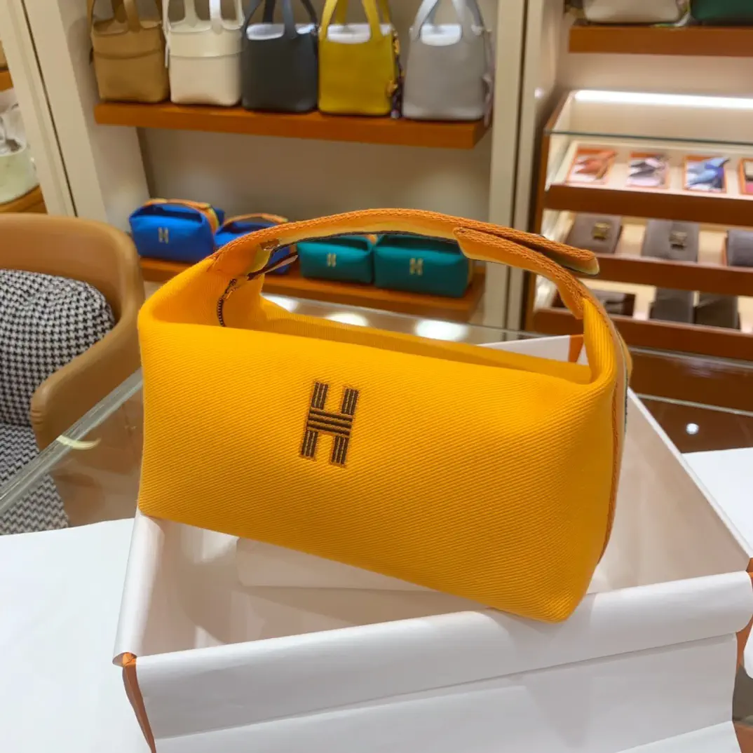 Hermès Yellow Canvas Cosmetic Bag image 1