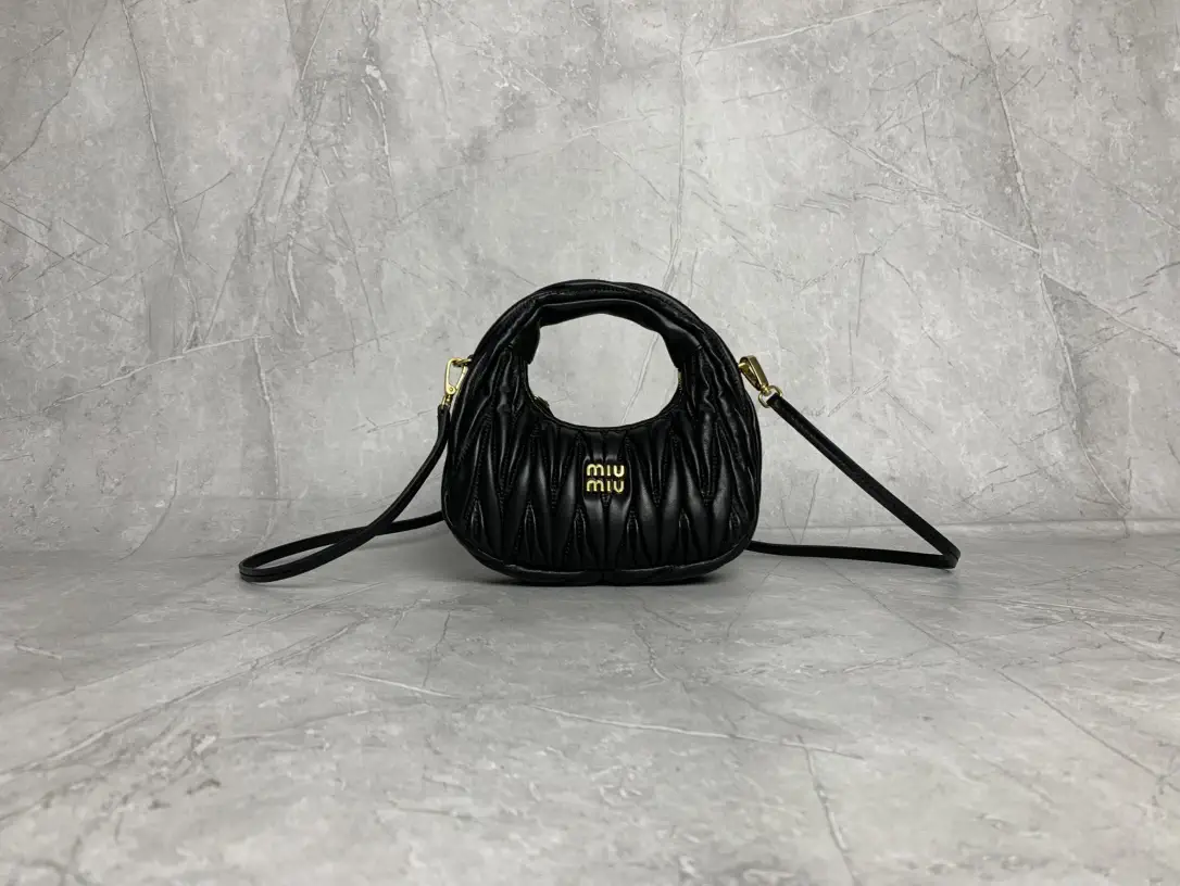 Miu Miu Quilted Mini Top Handle Bag image 1