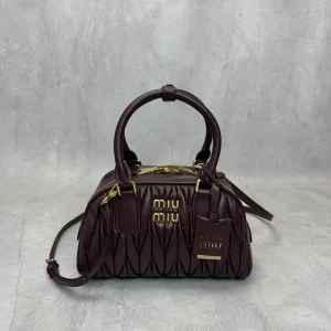 Miu Miu Quilted Top Handle Crossbody Bag image 1