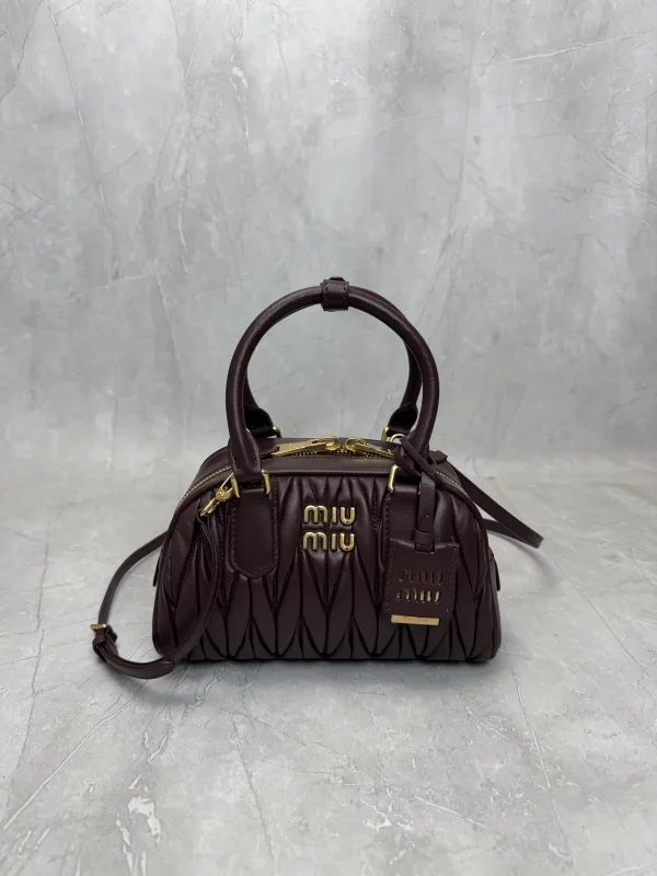 Miu Miu Quilted Top Handle Crossbody Bag image 1