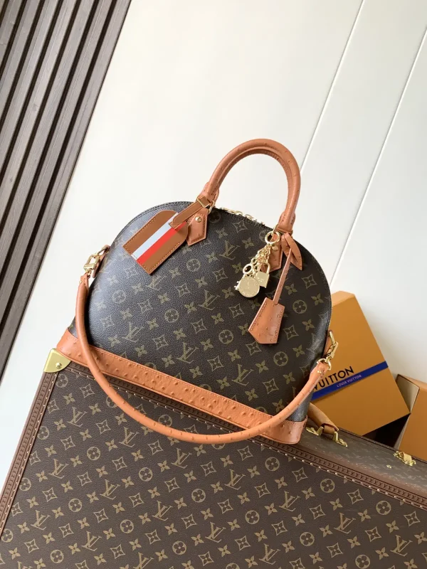 Louis Vuitton Alma Monogram Medium Top Handle Bag image 1