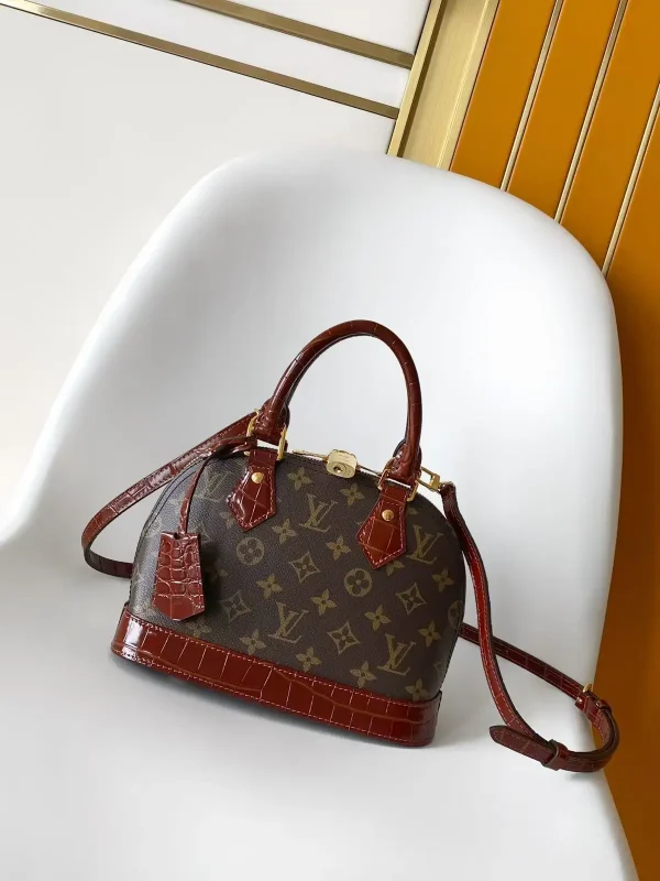 Louis Vuitton Monogram Canvas Alma BB Top Handle Bag with Crocodile-Embossed Trim image 1