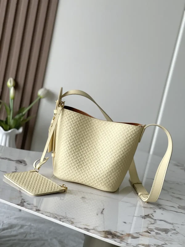 Louis Vuitton Cream Monogram Embossed Bucket Bag image 1