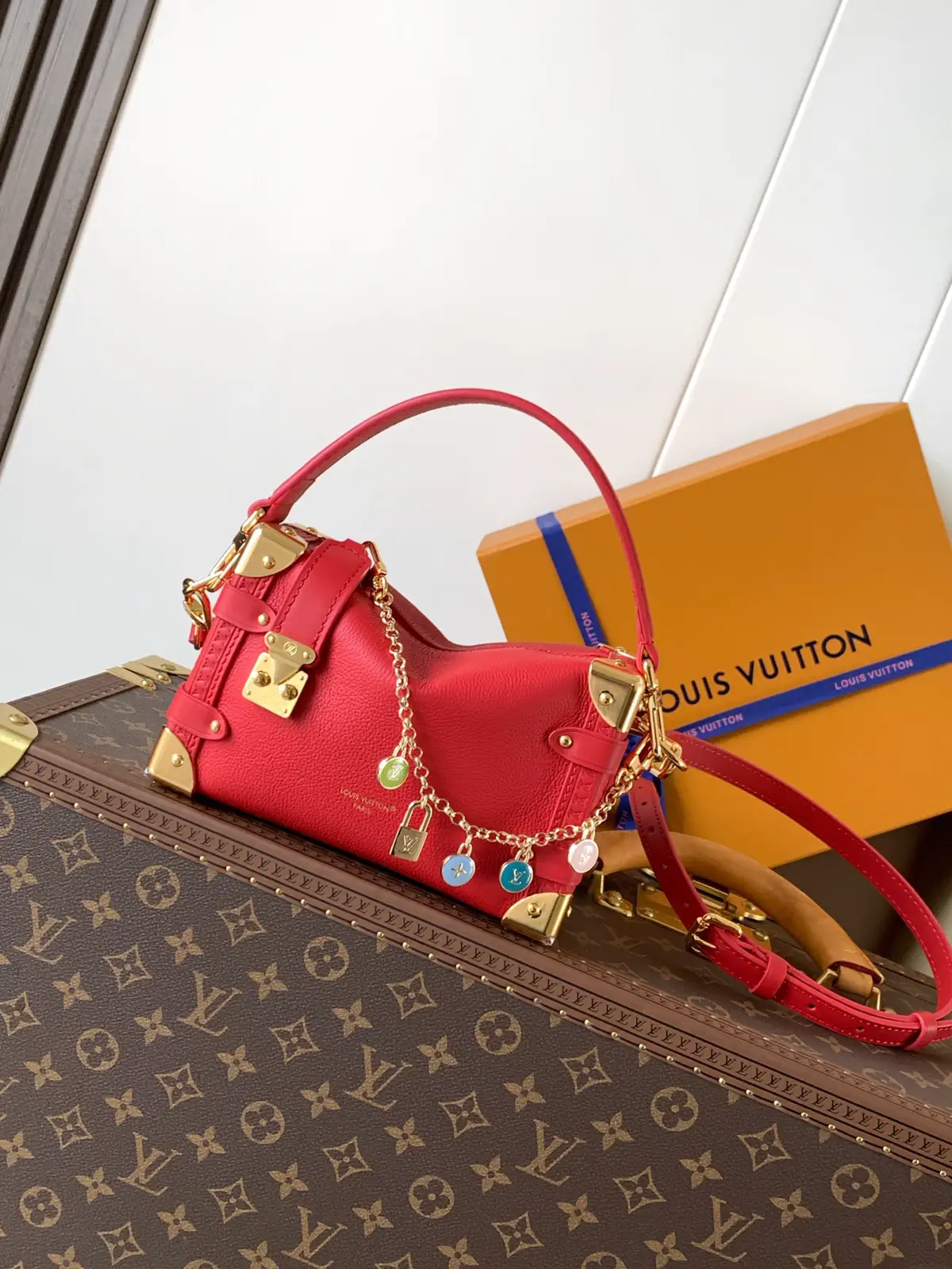 Louis Vuitton Red Side Trunk Top Handle Bag with Charm Chain image 1