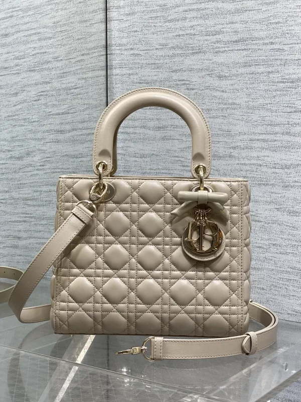 Dior Quilted Top Handle Bag with Bow Charm image 1