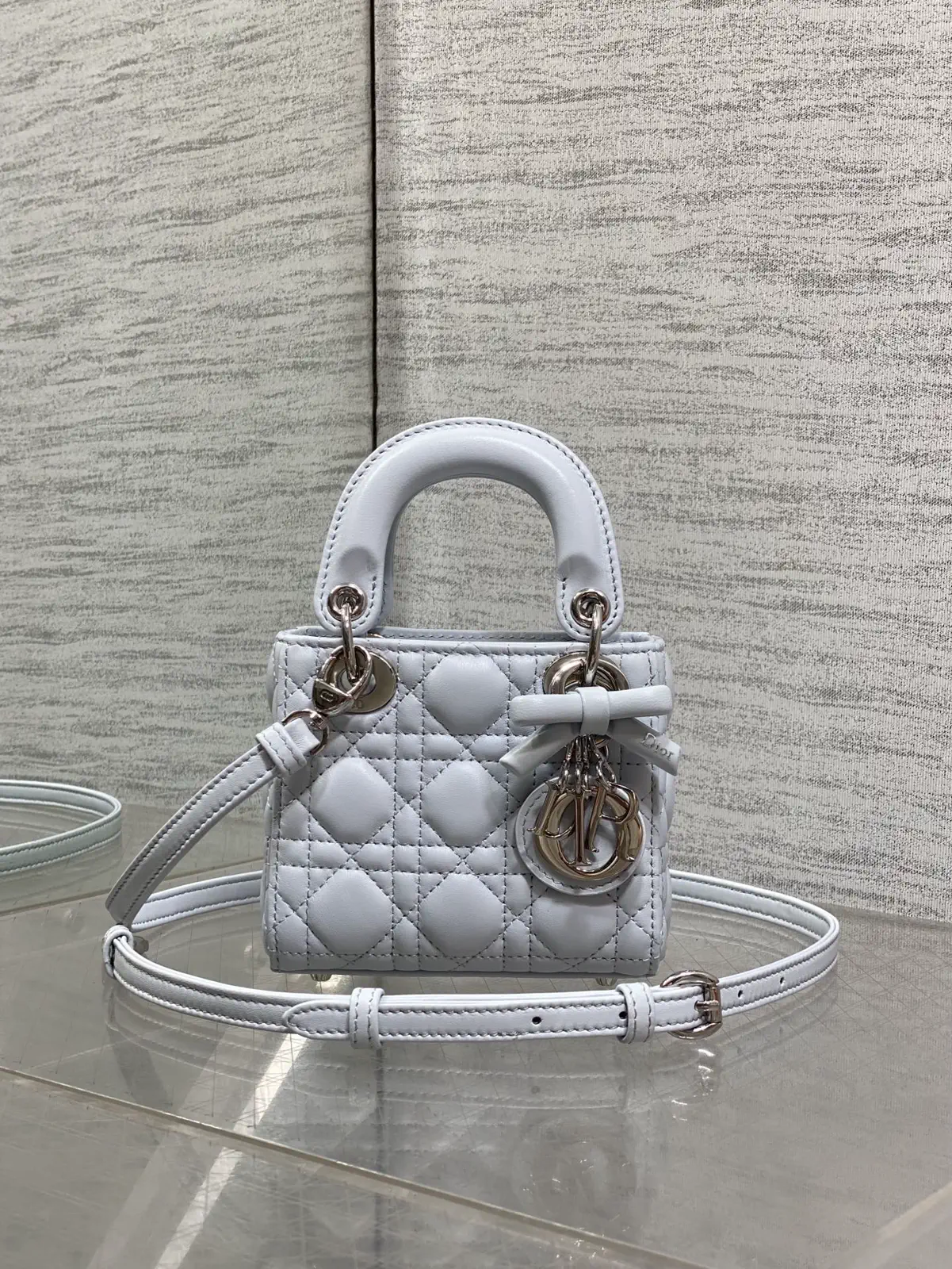 Dior Quilted Micro Top Handle Bag with Bow Charm image 1