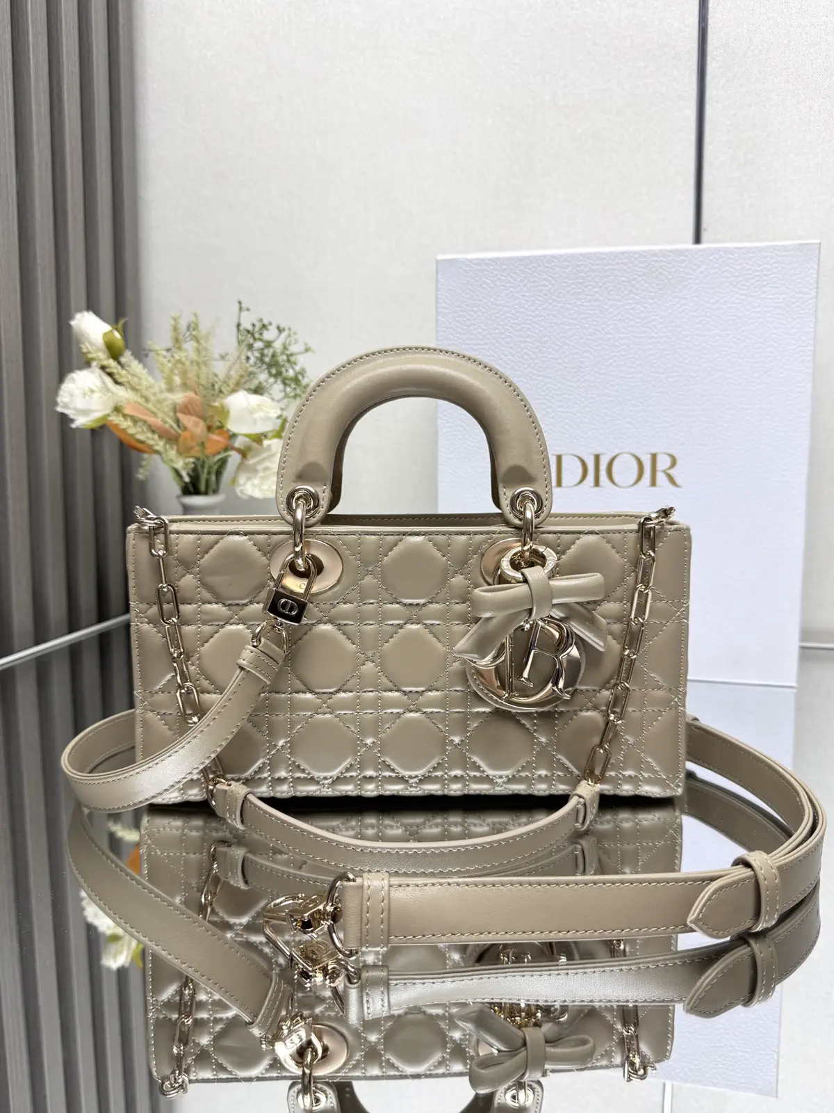 Dior Quilted Top Handle Bag with Bow Charm image 1