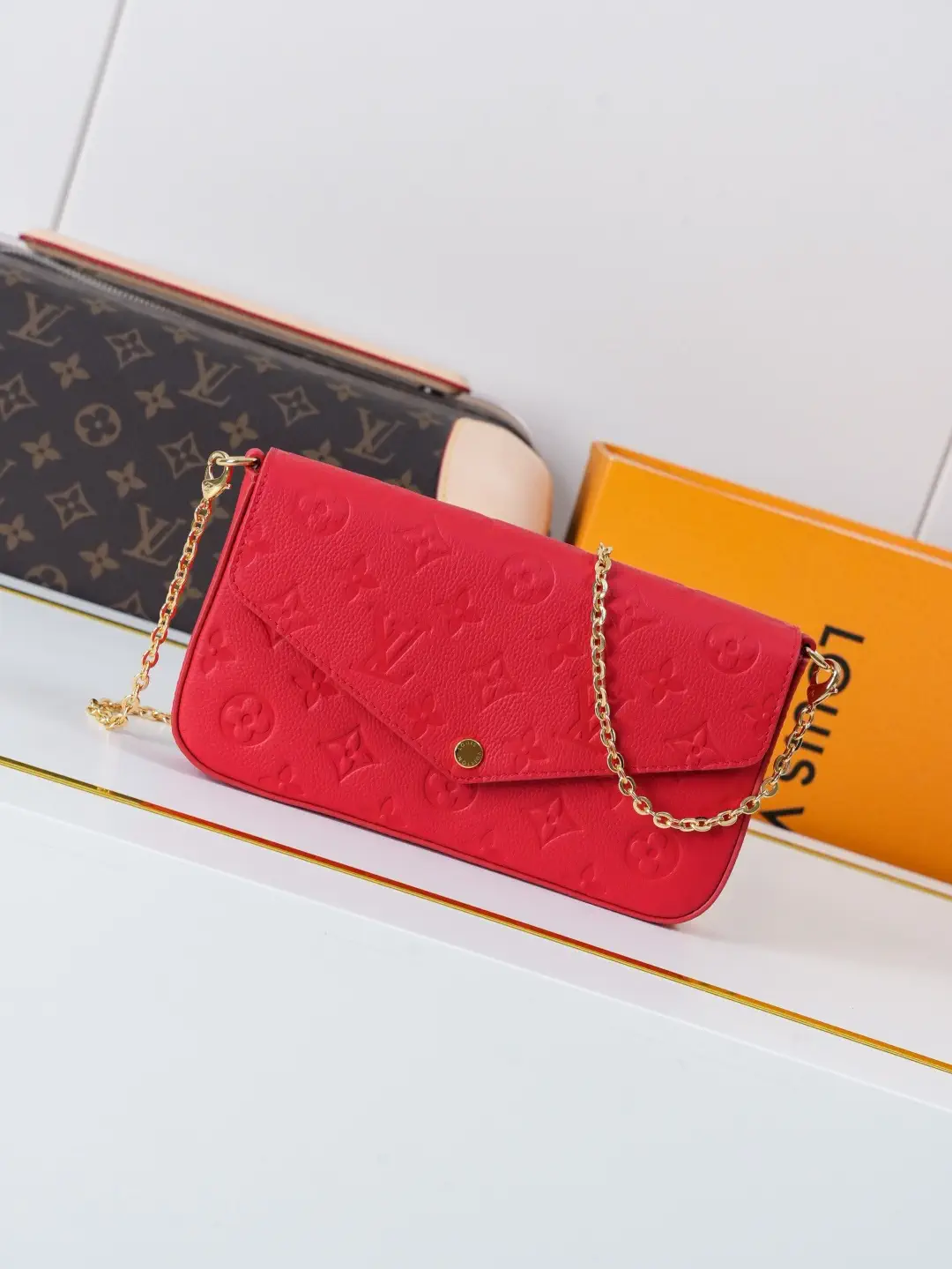 Louis Vuitton Red Monogram Empreinte Pochette Félicie Chain Bag image 1