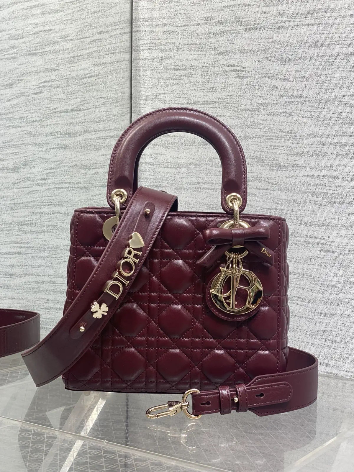 Dior Quilted Top Handle Bag with Bow Charm image 1
