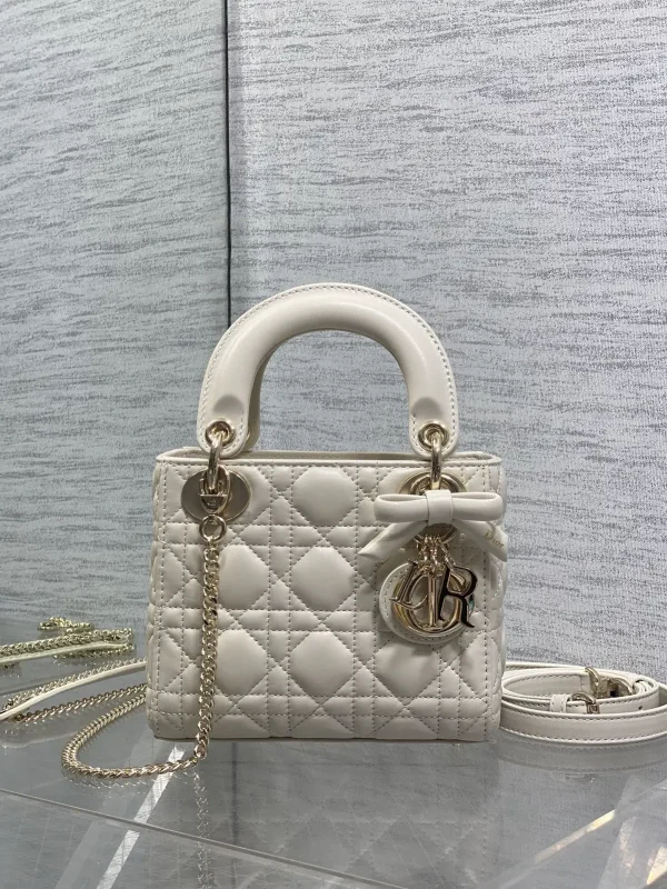 Dior White Quilted Top Handle Bag with Bow Charm image 1