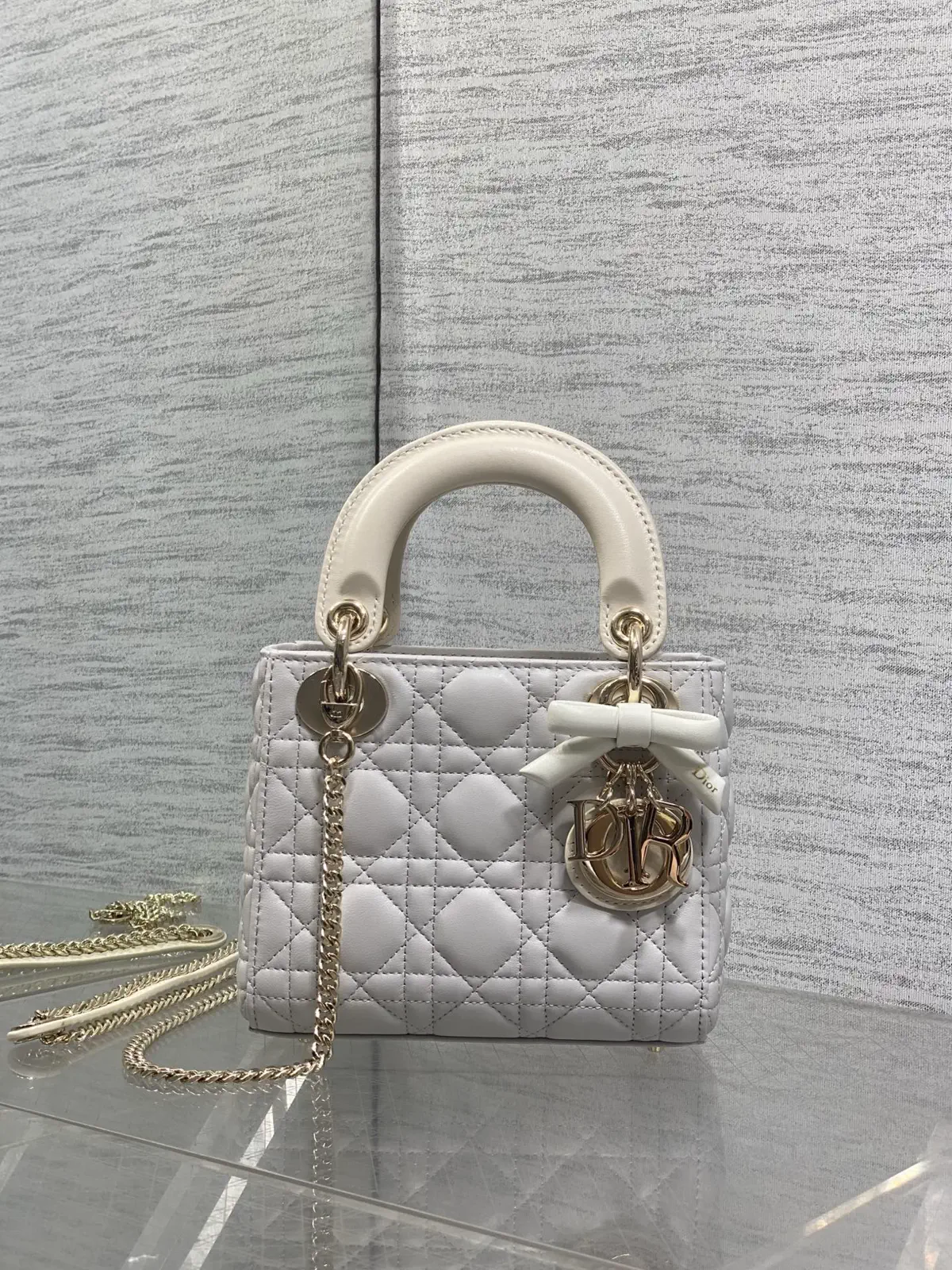 Dior Quilted Top Handle Bag with Bow Charm image 1