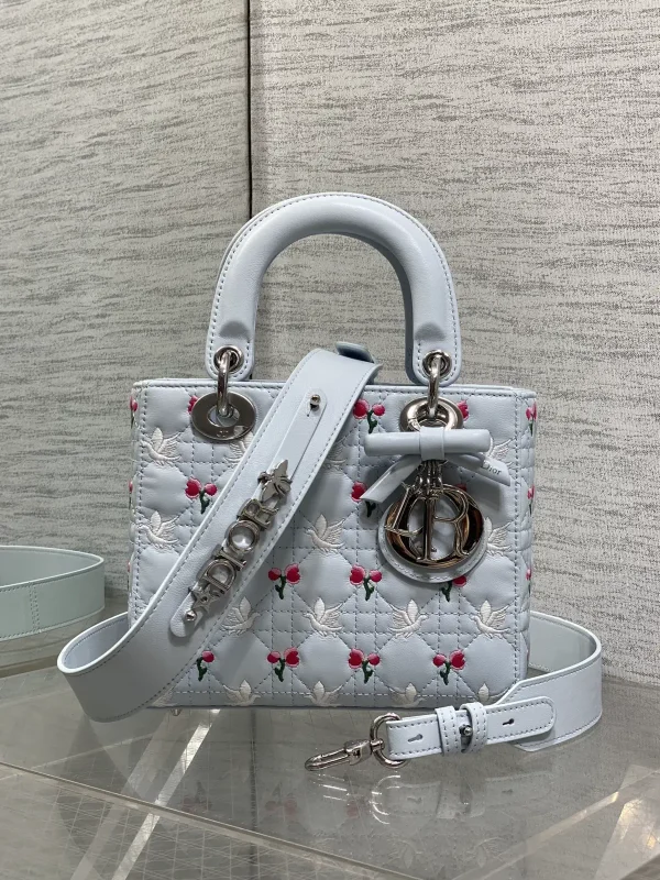 Dior Light Blue Quilted Top Handle Bag with Dove and Tulip Embroidery image 1