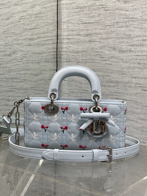 Dior Light Blue Quilted Top Handle Bag with Dove and Tulip Embroidery image 1