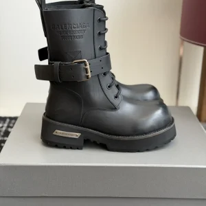 Balenciaga Distressed Leather Combat Boots image 1